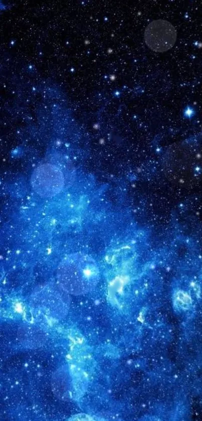 Vibrant starry blue cosmic wallpaper with galaxies and stars.