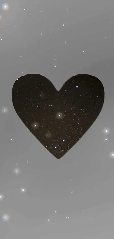 Heart-shaped starry design on gray background.