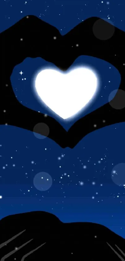 Heart-shaped hands under a starry night sky.