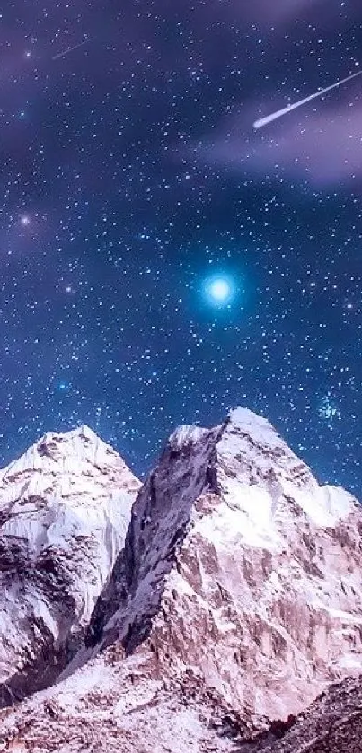 Starry night sky with mountains below, creating a serene wallpaper.