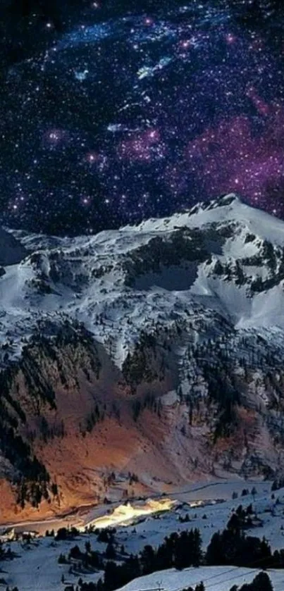 Starry night sky over snow-covered mountains.