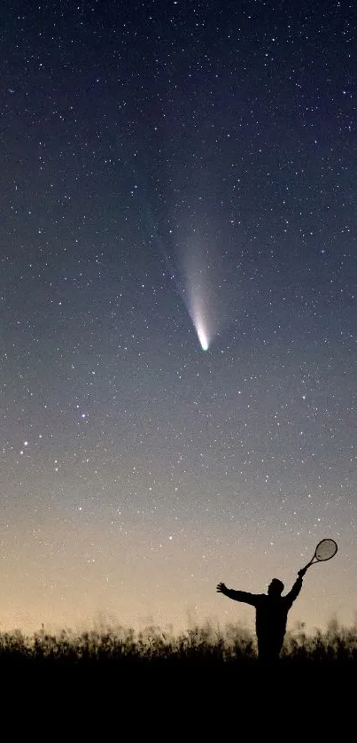 Silhouette against starry night sky with visible comet trail.