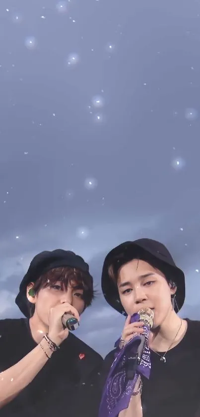 Starry night concert wallpaper featuring two performers under a vibrant sky.