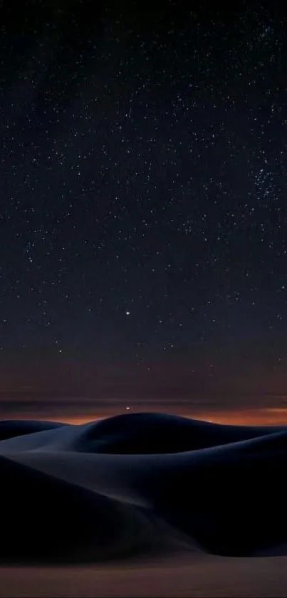 Starry night over desert dunes wallpaper.