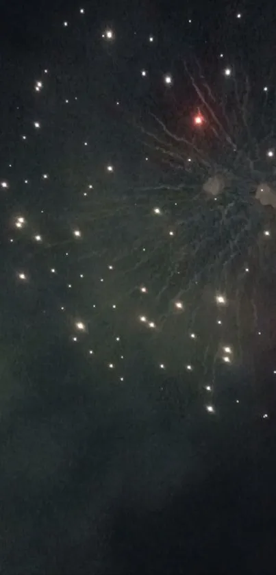 Starry night sky with fireworks display creating a festive atmosphere.