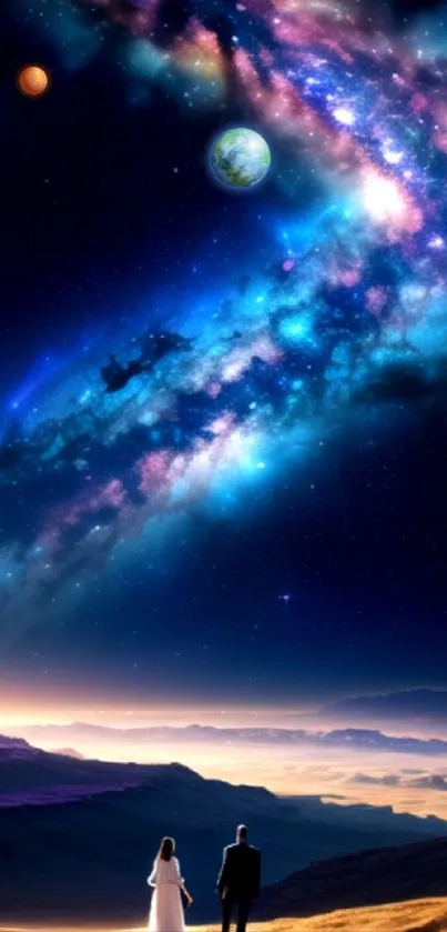 Couple under a starry galaxy in a scenic landscape.