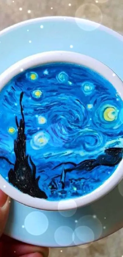 Latte art resembling Starry Night in a coffee cup on a Sky Blue saucer.