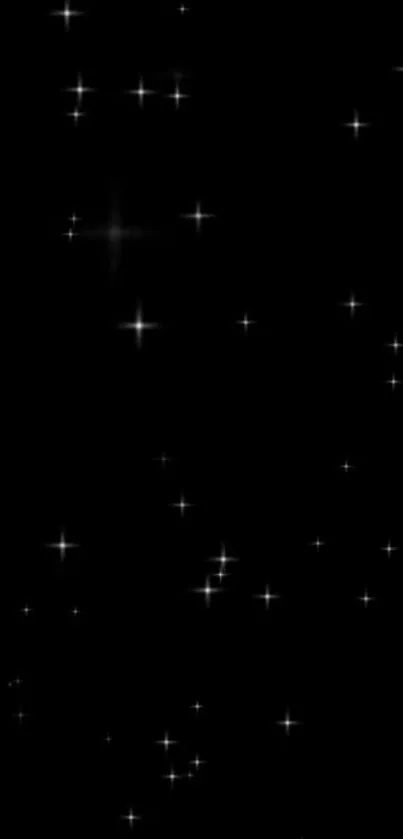 Starry mobile wallpaper with a black background and sparkling white stars.