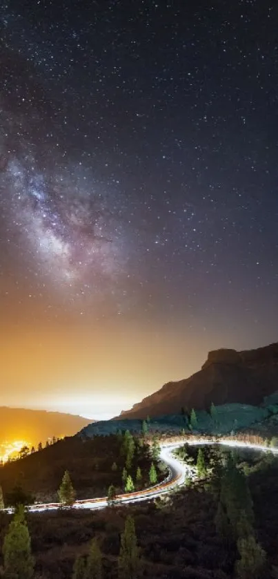 Starry night over a mountain road with glowing stars and galaxy above.