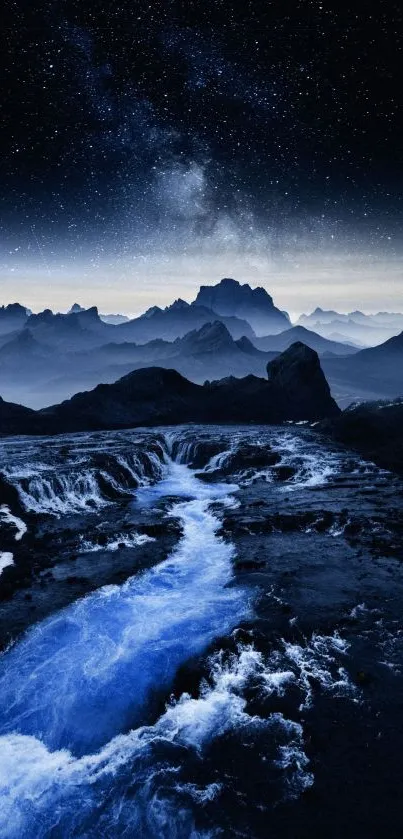 Starry night mountain with blue river and silhouetted peaks.