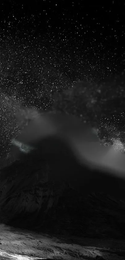 Starry night over a dark mountain landscape, showcasing a cosmic sky scene.