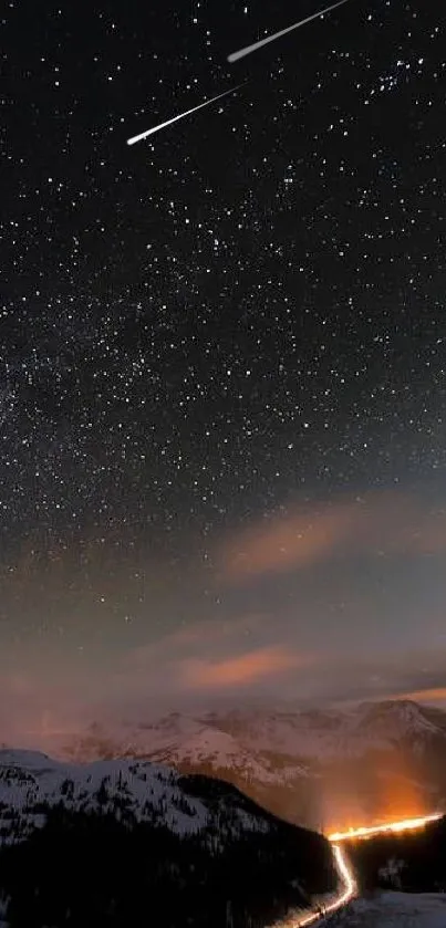 Starry sky over snowy mountains with glowing lights at night.