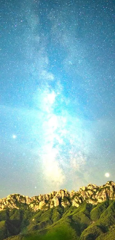 Starry night sky above majestic mountains.