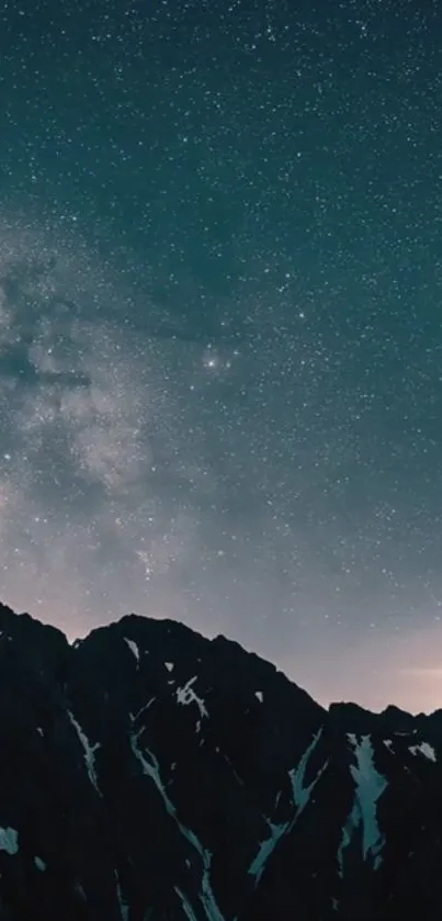 Starry night sky over dark mountainous silhouette.