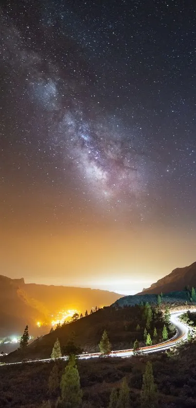 Starry night over a winding mountain road under the Milky Way sky.