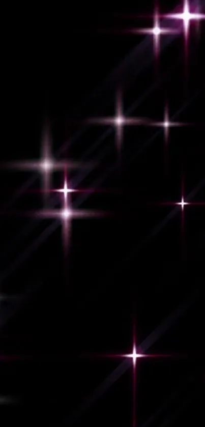 Black wallpaper with pink glowing stars.