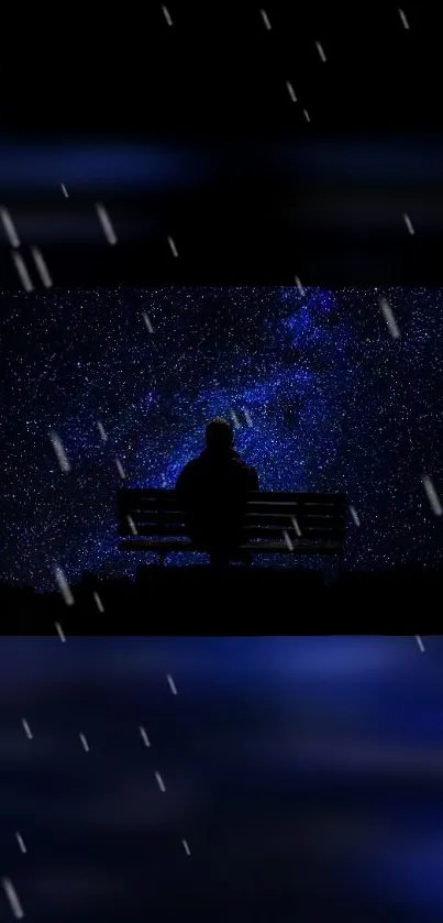 Silhouette sitting under a starry night sky, capturing the vastness of the galaxy.