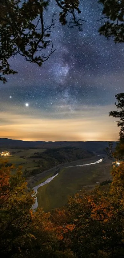 Starry night over a river landscape with a tranquil view.