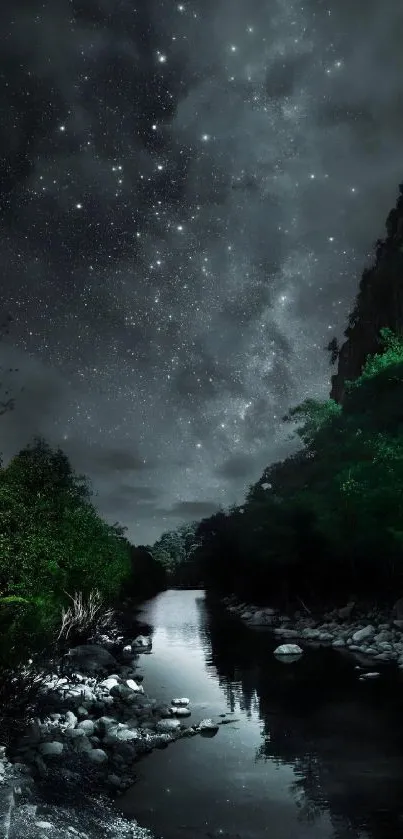 Starry night sky over a tranquil river with lush green trees.