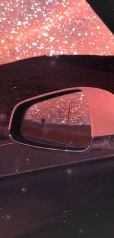 Starry night view reflected in car mirror.