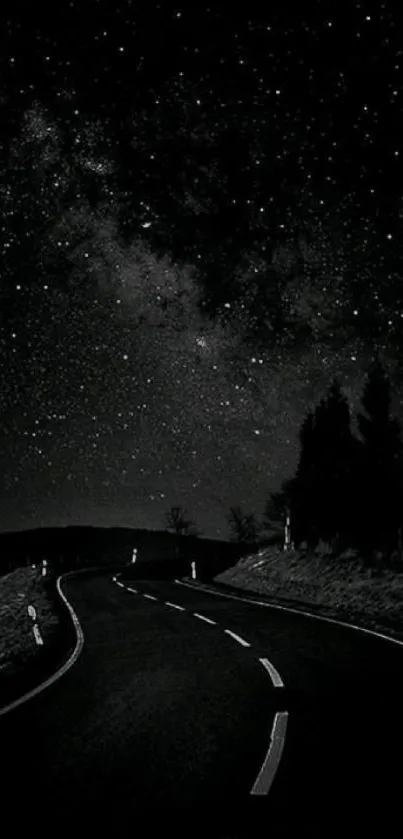 Starry night road under a dark sky with a galaxy view.