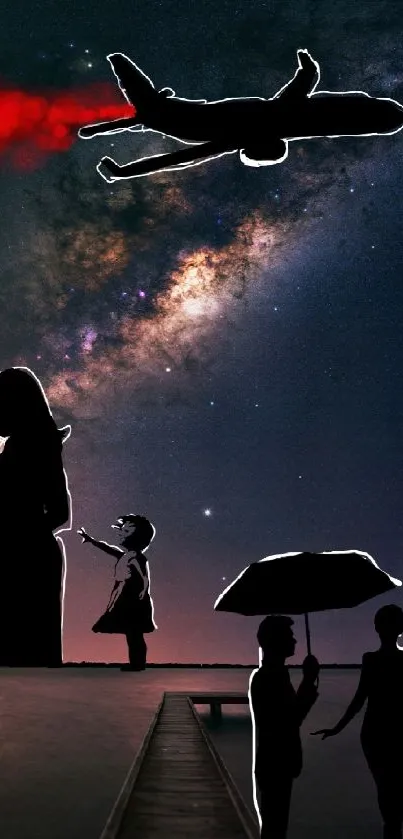 Silhouetted figures under a starry sky with an airplane flying overhead.