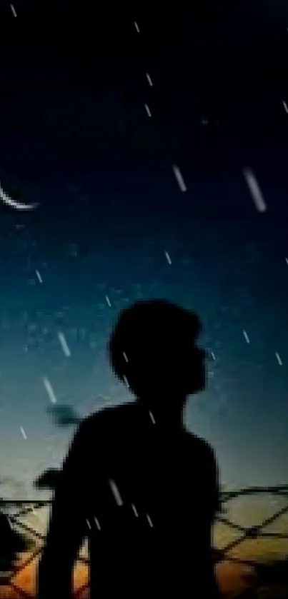 Silhouette against a starry night sky with crescent moon wallpaper.