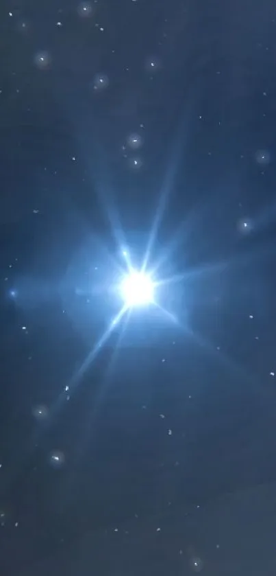 Bright star in a dark blue night sky with scattered stars.