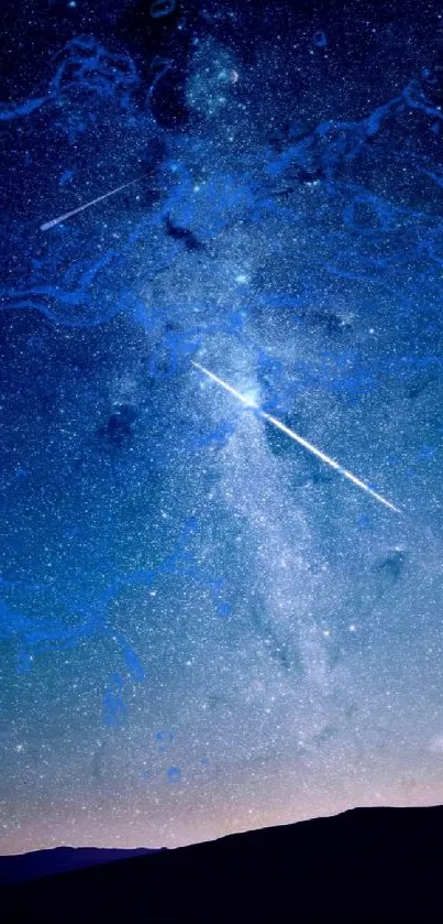 Starry night sky wallpaper with a shooting star in deep blue hues.