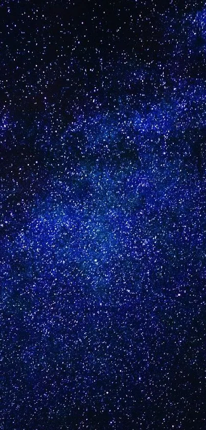 Starry night sky wallpaper with deep blue hues and twinkling stars.