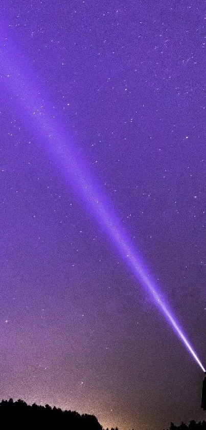 Starry night sky with purple beam and silhouette.