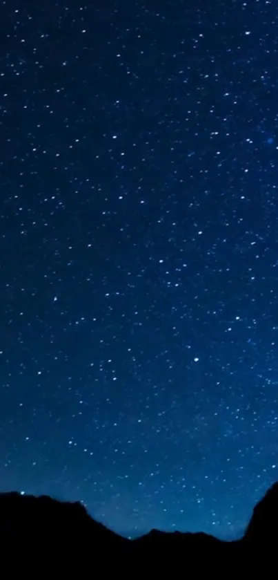 Starry night sky wallpaper with deep blue and sparkling stars.