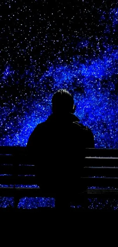 Silhouette on bench under starry blue night sky wallpaper.