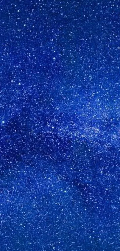 Starry night sky wallpaper with vibrant blue tones.