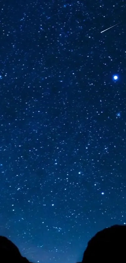 Beautiful starry night sky with dark blue hues and scattered stars.