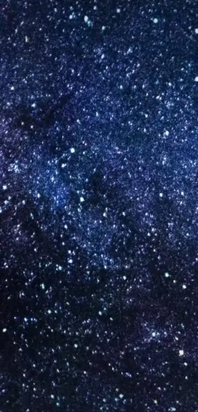 Stunning starry night sky wallpaper with deep blue hues and sparkling stars.