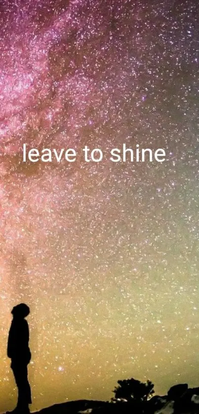 Silhouette against a starry galaxy under a purple night sky.