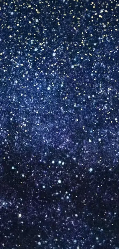 Starry night sky wallpaper with deep blue background and twinkling stars.