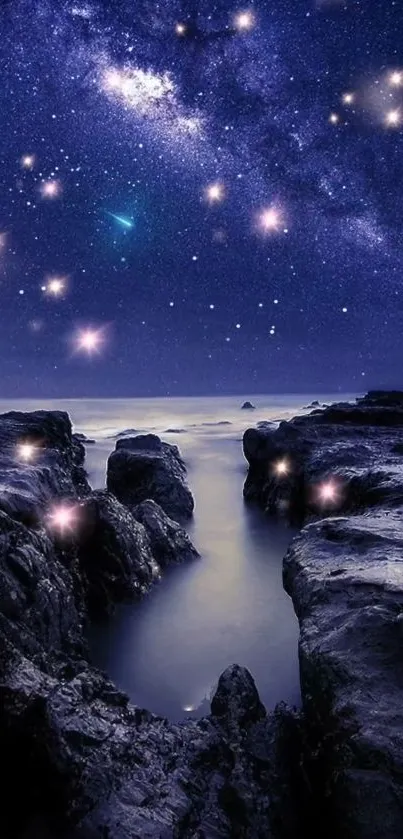 Starry night sky over ocean rocks with glowing stars and galaxy.