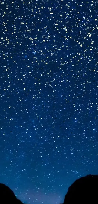 Starry night sky with countless bright stars twinkling in the serene dark blue sky.