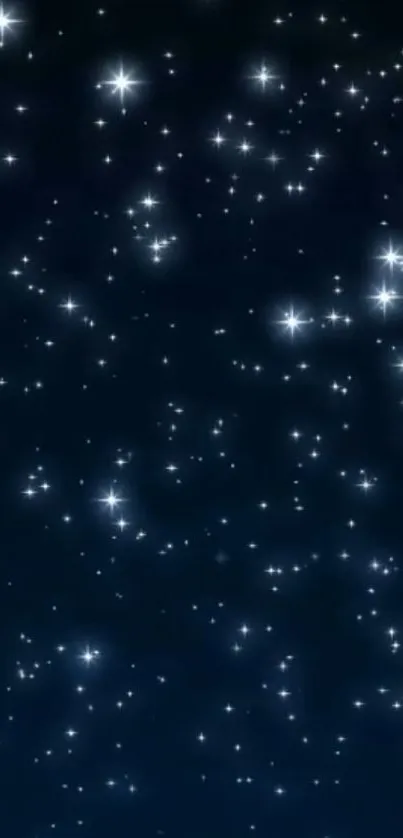 A starry sky with white stars on a deep blue background.