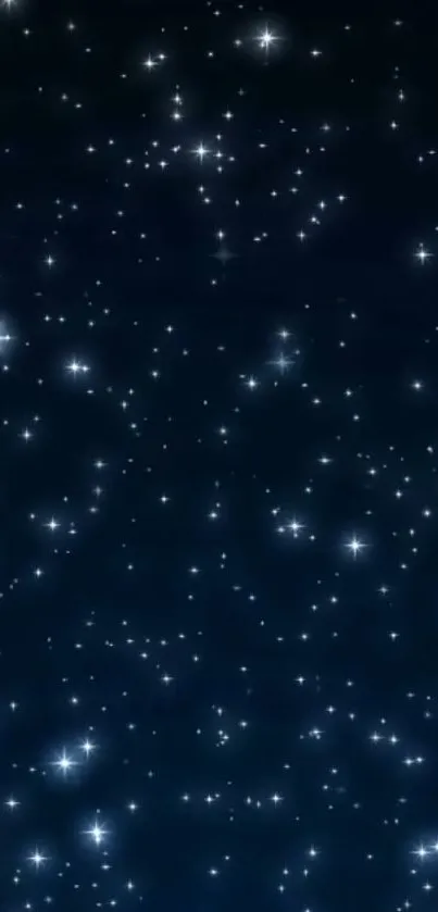 Starry night sky wallpaper with sparkling stars on a deep blue background.