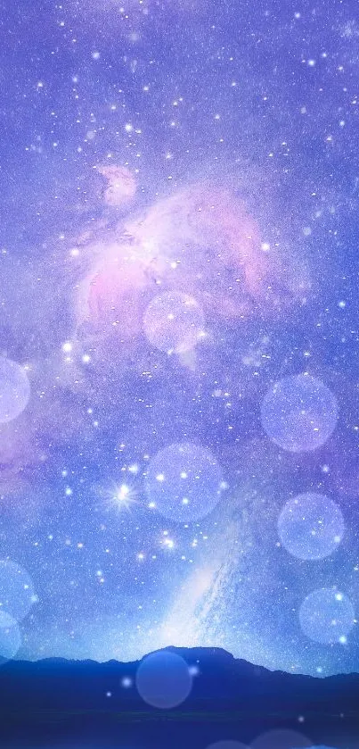 Purple-blue galaxy night sky wallpaper with stars.