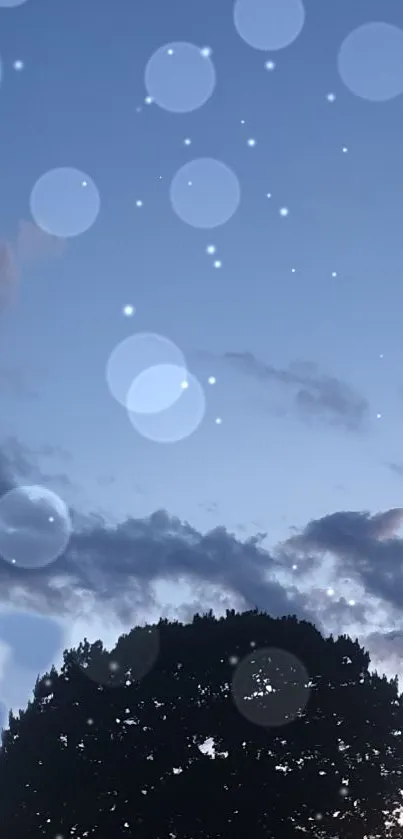 Starry night sky with a silhouetted tree and glowing orbs.