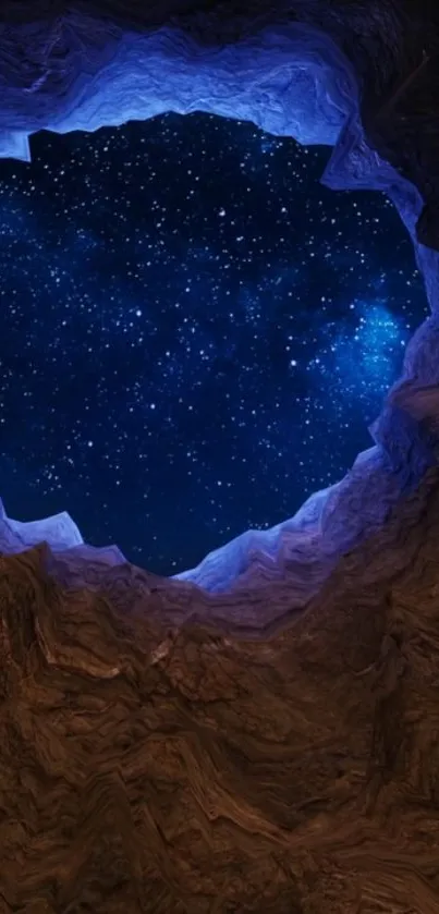 Starry night sky through rocky cave opening.