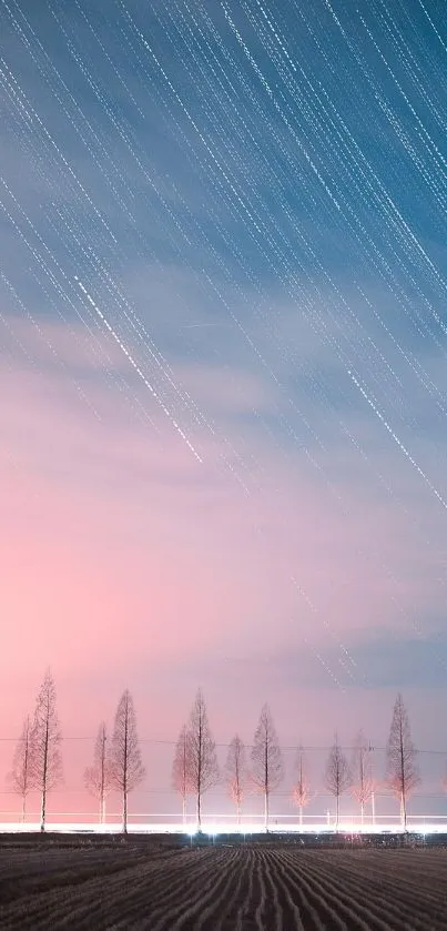 Starry night sky over a tranquil forest landscape with soft clouds.