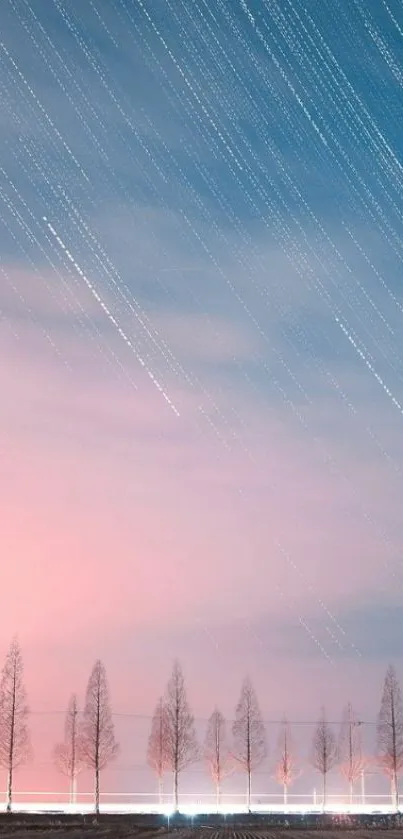 Dreamy pastel sky with star trails and silhouetted trees in pink and blue hues.