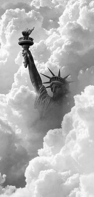 Monochrome wallpaper of Statue of Liberty in clouds.