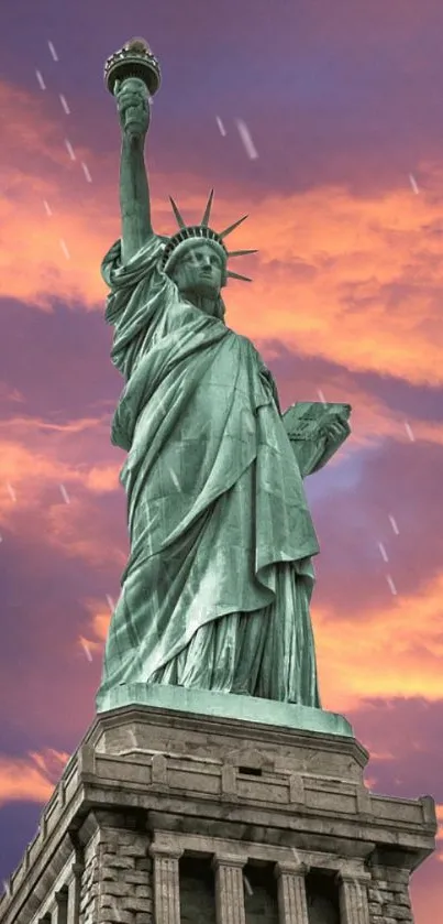 Statue of Liberty at sunset with vibrant sky.