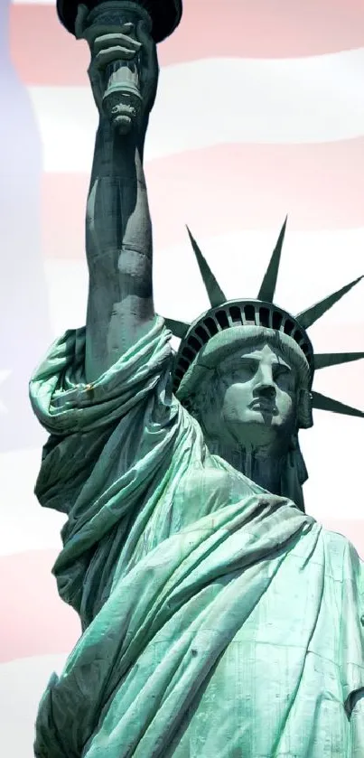 Statue of Liberty with American flag backdrop, mobile wallpaper.